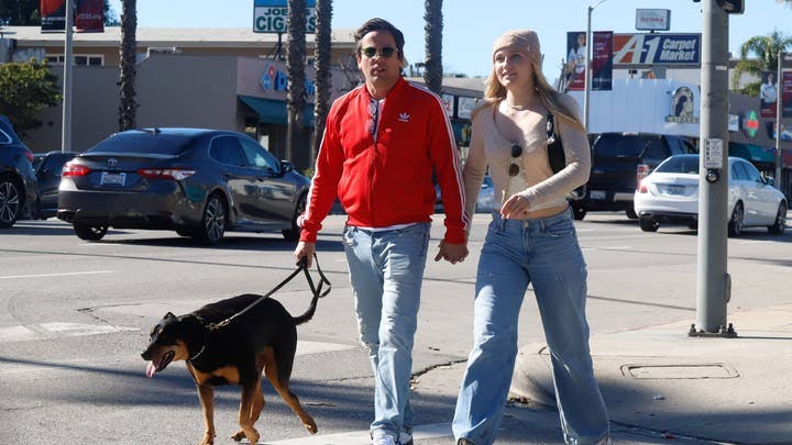 Maggie Sajak and Ross McCall enjoy a casual stroll in Los Angeles.  (Mega)