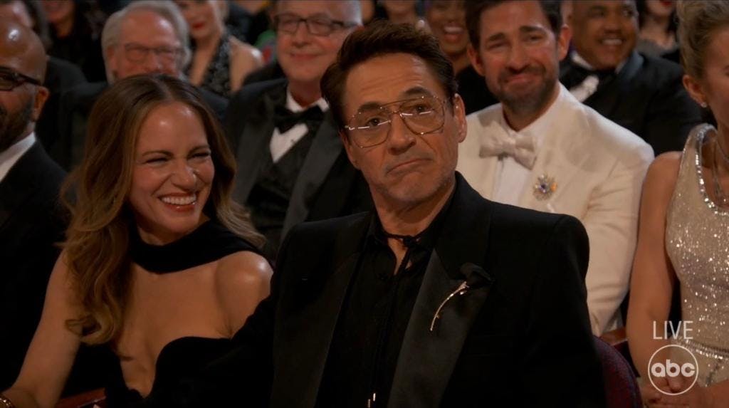 Downey didn’t smile after Oscars host Jimmy Kimmel made a joke about his past drug use. ABC